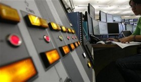 scientist-looks-at-computer-screens-at.jpg
